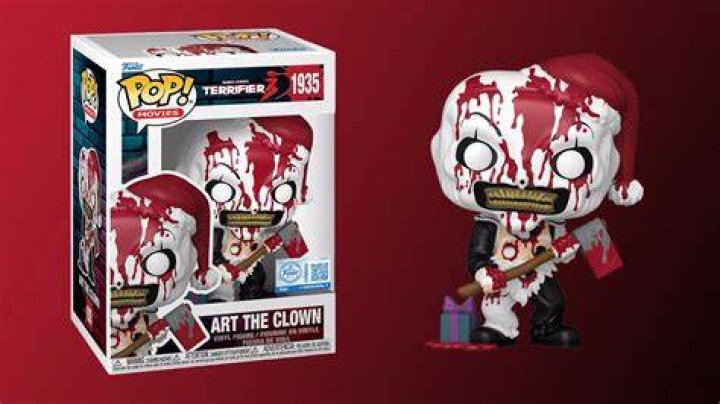 Art the Clown pops his head out of a window.
