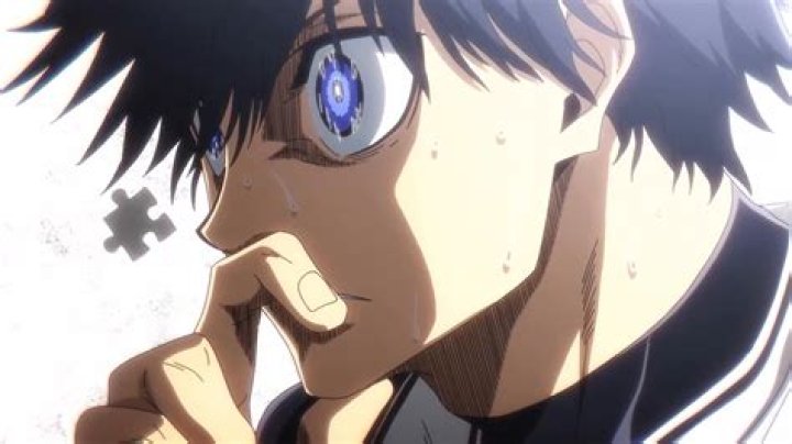 Yoichi Isagi looking serious in the pitch in 'Blue Lock' season 1.